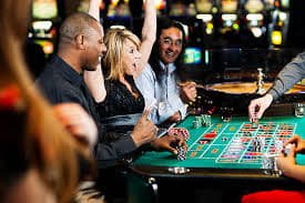 Live dealer conducting a First Goal round on togelup 125 studio broadcast